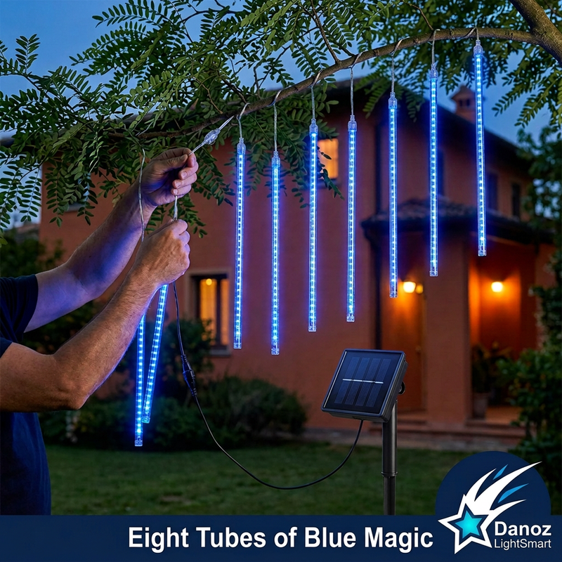 Hands securing eight blue meteor tubes with solar panel in the garden