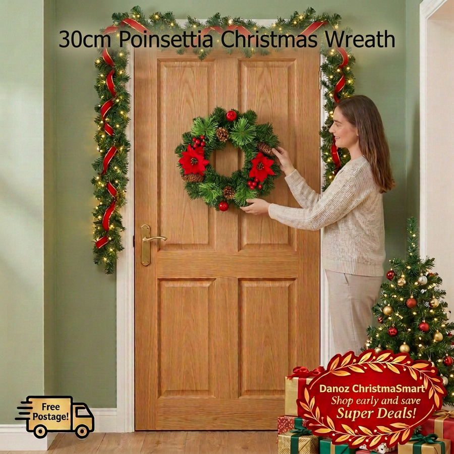 Woman arranging poinsettia Christmas wreath in festive entryway
