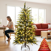 Warm white LED Christmas tree in a sunny living room