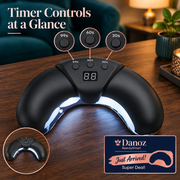 Black nail lamp timer close-up on walnut surface