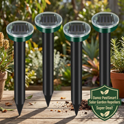 Danoz PestSmart four solar repeller stakes on a garden bench