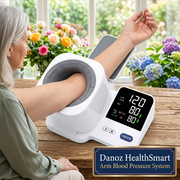 Older woman using integrated arm monitor with large Danoz HealthSmart Arm Blood Pressure System badge