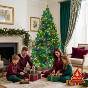 Family wrapping gifts beside the pre-lit green fir tree