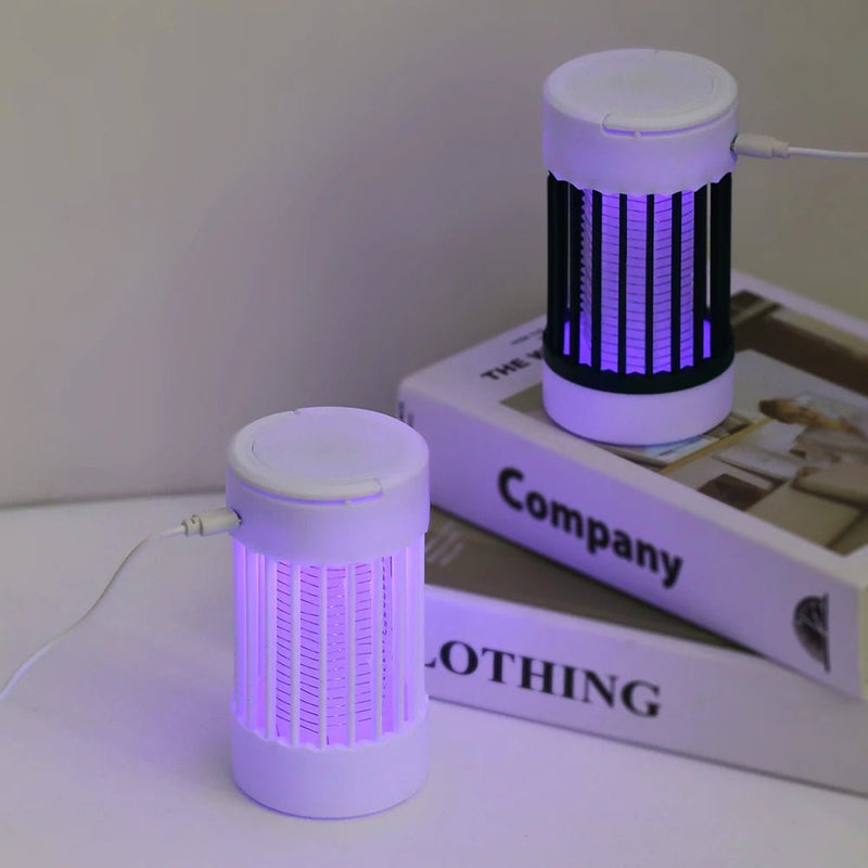 Say goodbye to pesky bugs with Danoz USB Electric Shock Mosquito Killer Lamp! This clever device uses UV light to attract and zap mosquitoes, moths, wasps and more. Buy 1 Get 1 Free! - danozdirect