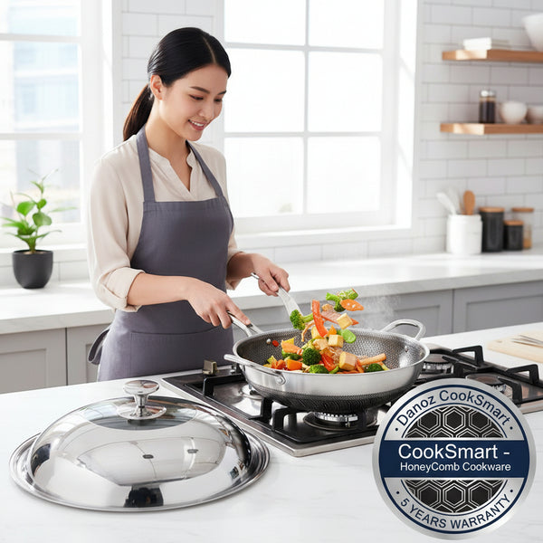 A 34cm stainless steel double ear non-stick stir fry cooking kitchen wok pan with a lid, featuring a honeycomb pattern on the bottom.