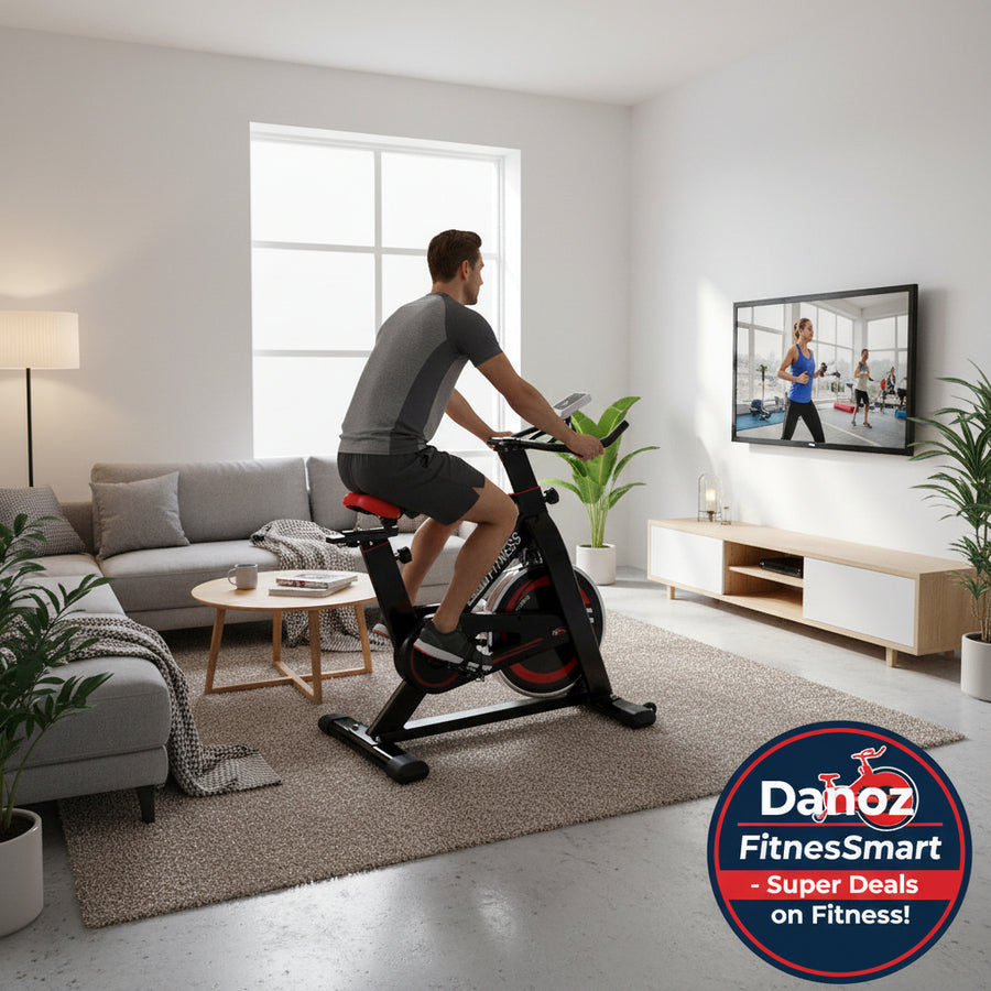 A black and red Danoz Direct - Everfit Spin Bike with a robust industrial-strength steel frame, a heavy-duty flywheel, and an LCD monitor.