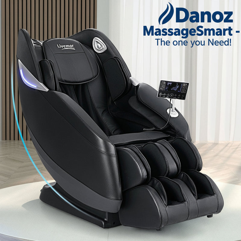 A black Livemor electric massage chair with a sleek design, featuring a headrest, backrest, seat, and leg rests. A remote control is visible, and there is a blue light illuminating the chair's control panel.
