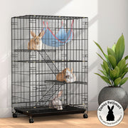 A three-level indoor pet cage with a black powder-coated wrought iron frame, featuring two rabbits on the top two levels, a guinea pig on the top level, and a ferret on the bottom level. The cage has castor wheels for mobility and is placed in a room with natural lighting.