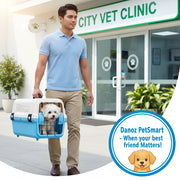 A small portable plastic dog or cat carrier in blue and white color with a black metal grid door and a plastic tray inside.