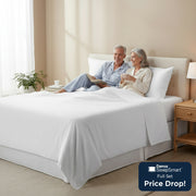 A white, 400TC bamboo cotton premium sheet set on a bed, including a flat sheet, fitted sheet, and two pillowcases.