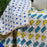 Danoz Direct -  GOTS Certified Organic Cotton Reversible Baby Quilt (100x120cm) - Yellow Cars